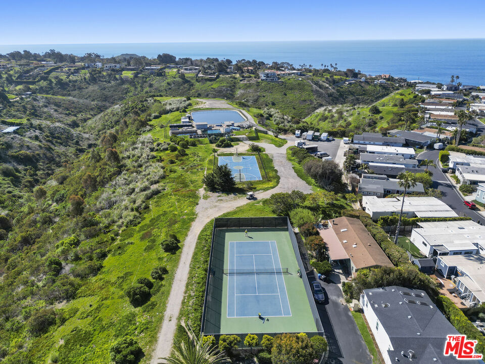 29500 Heathercliff Road, Unit 220 Malibu, CA 90265 - Photo 42 of 43 an aerial view of residential houses with outdoor space