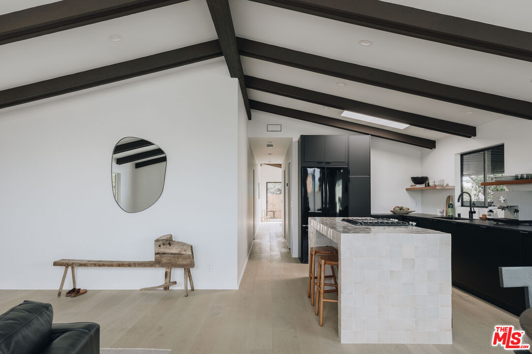 29500 Heathercliff Road, Unit 220 Malibu, CA 90265 - Photo 8 of 43 a kitchen with a sink stainless steel appliances and cabinets