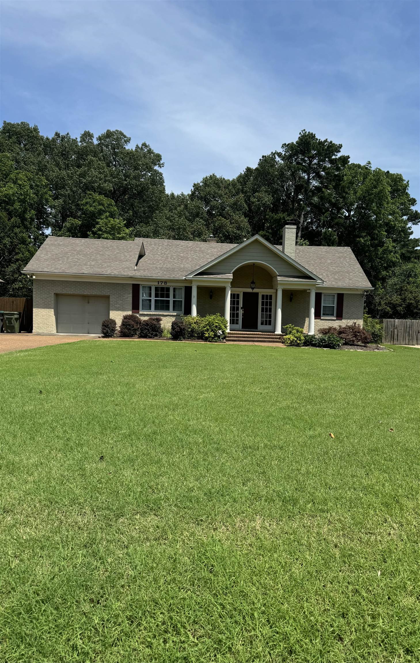 a view of a house with a big yard