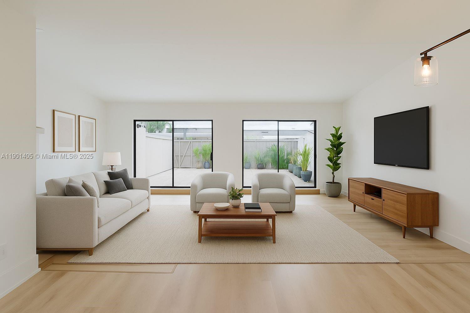 a living room with furniture and a flat screen tv