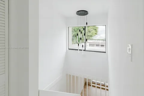 a view of an entryway with a window