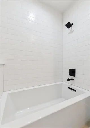 a bathroom with a bathtub