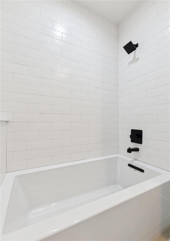3230 Elihu Street, Unit 2 Dallas, TX 75210 - Photo 13 of 20 a bathroom with a bathtub