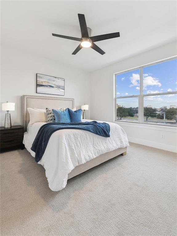 3230 Elihu Street, Unit 2 Dallas, TX 75210 - Photo 16 of 20 a bedroom with a bed and window