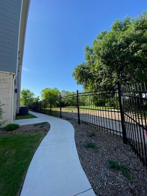 3230 Elihu Street, Unit 2 Dallas, TX 75210 - Photo 19 of 20 a view of a yard with large trees