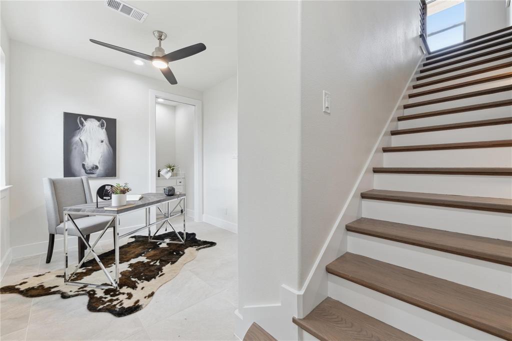 3230 Elihu Street, Unit 2 Dallas, TX 75210 - Photo 5 of 20 a room with gym equipment and a mirror