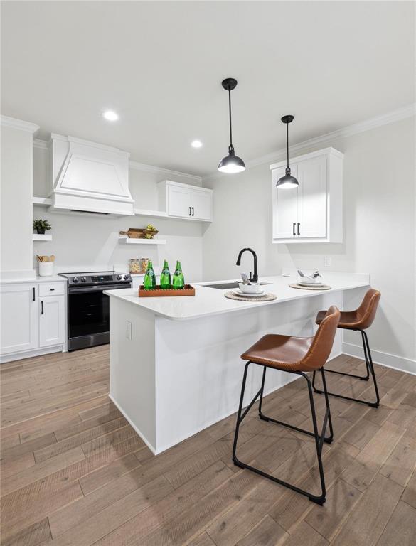 3230 Elihu Street, Unit 2 Dallas, TX 75210 - Photo 8 of 20 a kitchen with a sink cabinets and window