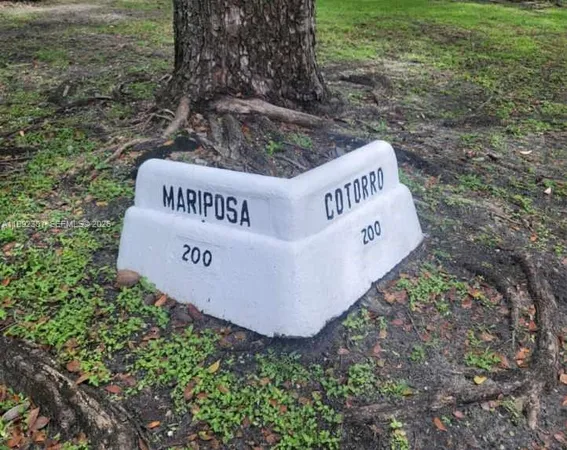 a sign on the side of the road