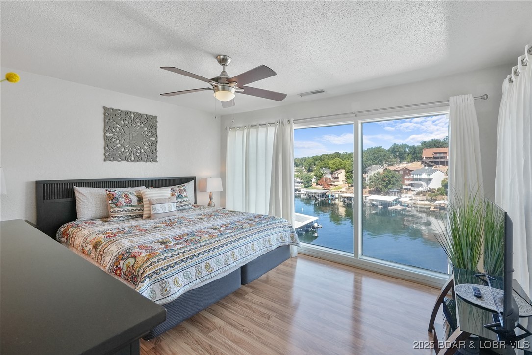245 Indian Pointe, Unit 245 Osage Beach, MO 65065 - Photo 3 of 31 Wake up each morning with waterfront views