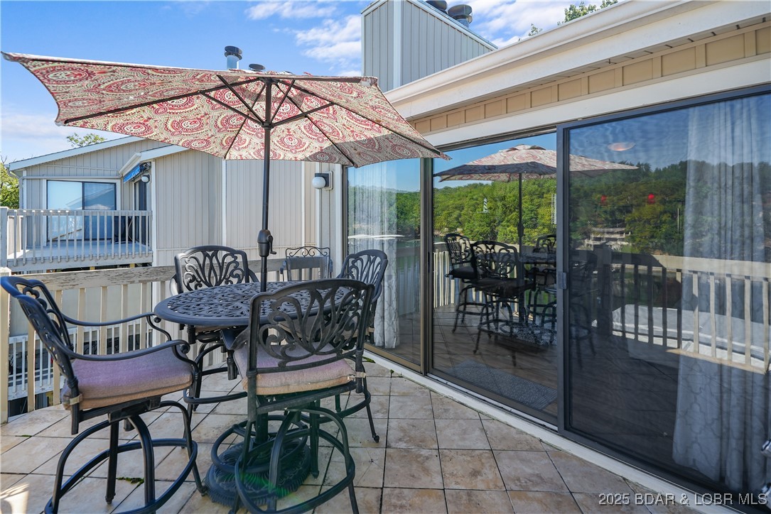 245 Indian Pointe, Unit 245 Osage Beach, MO 65065 - Photo 4 of 31 Top-floor corner unit to take in the sunshine