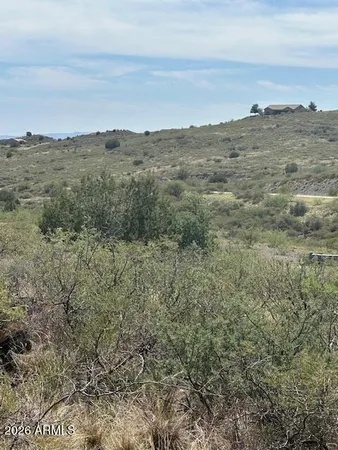 a view of mountain with sunset