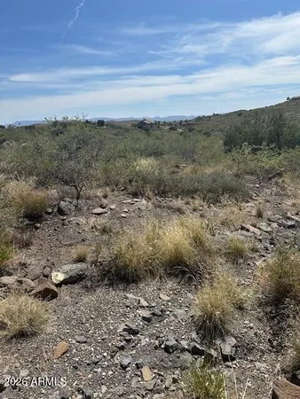 a view of mountain view with mountains in the background