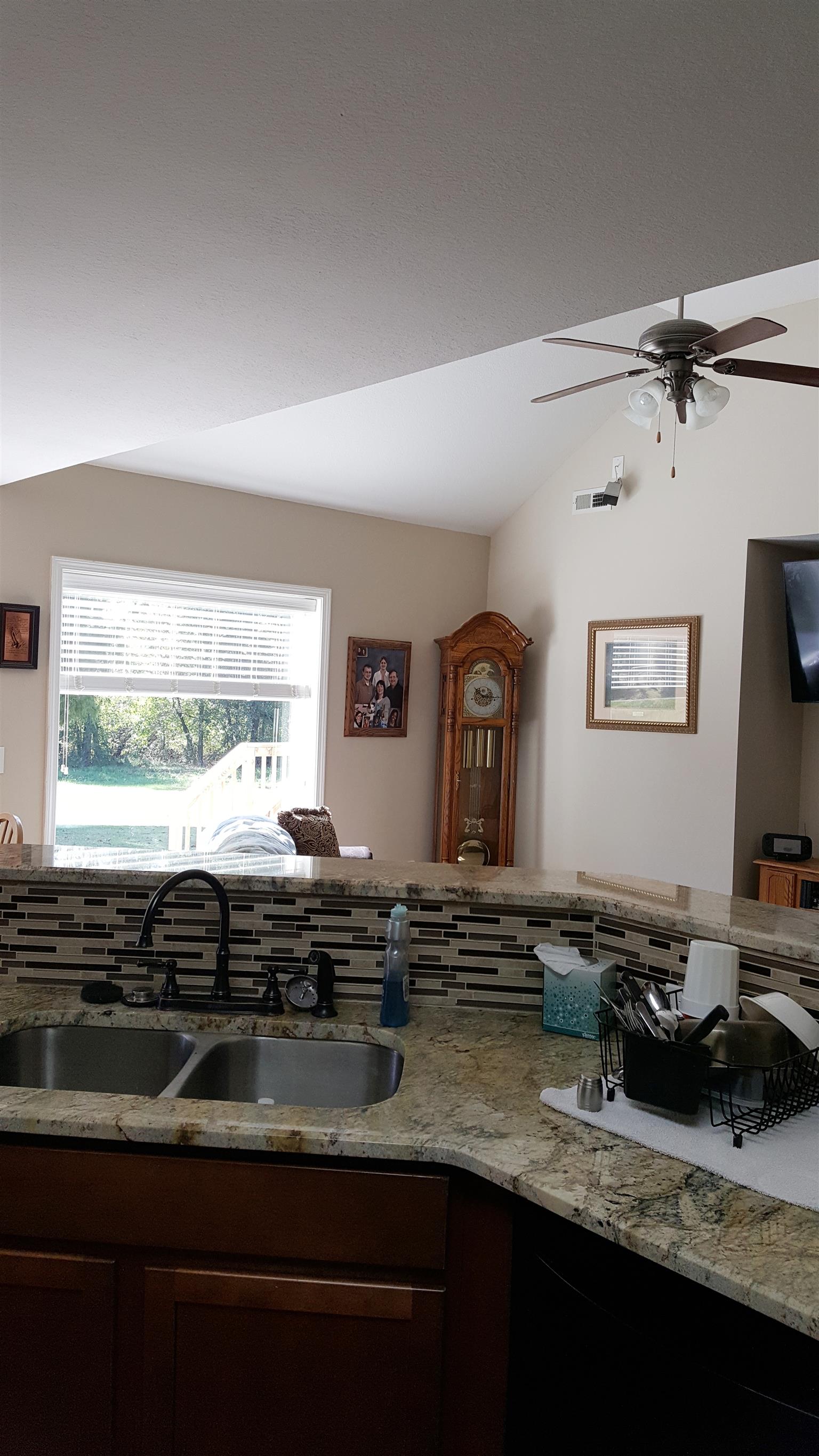 2960 Rossview Road Clarksville, TN 37043 - Photo 11 of 26 a kitchen with a sink and a stove top oven
