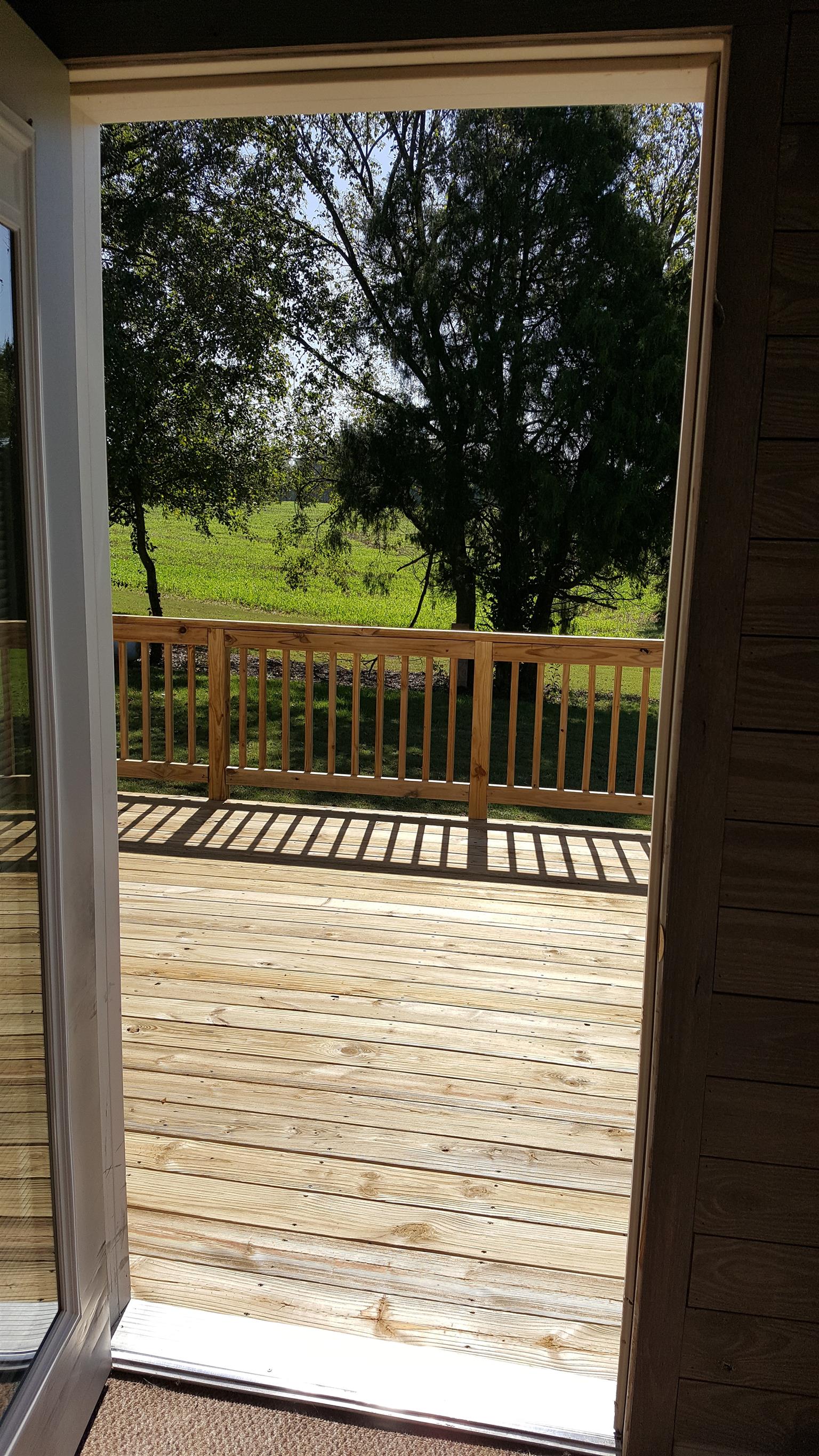 2960 Rossview Road Clarksville, TN 37043 - Photo 14 of 26 a view of a wooden deck