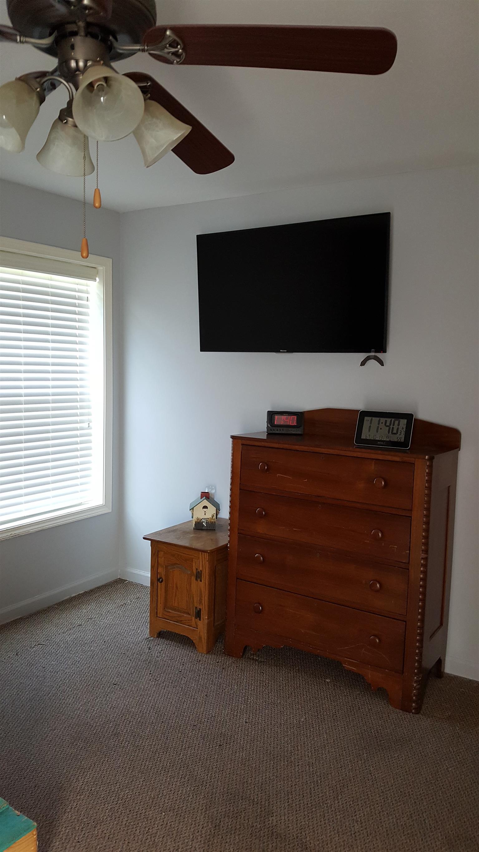 2960 Rossview Road Clarksville, TN 37043 - Photo 15 of 26 a living room with furniture and a flat screen tv