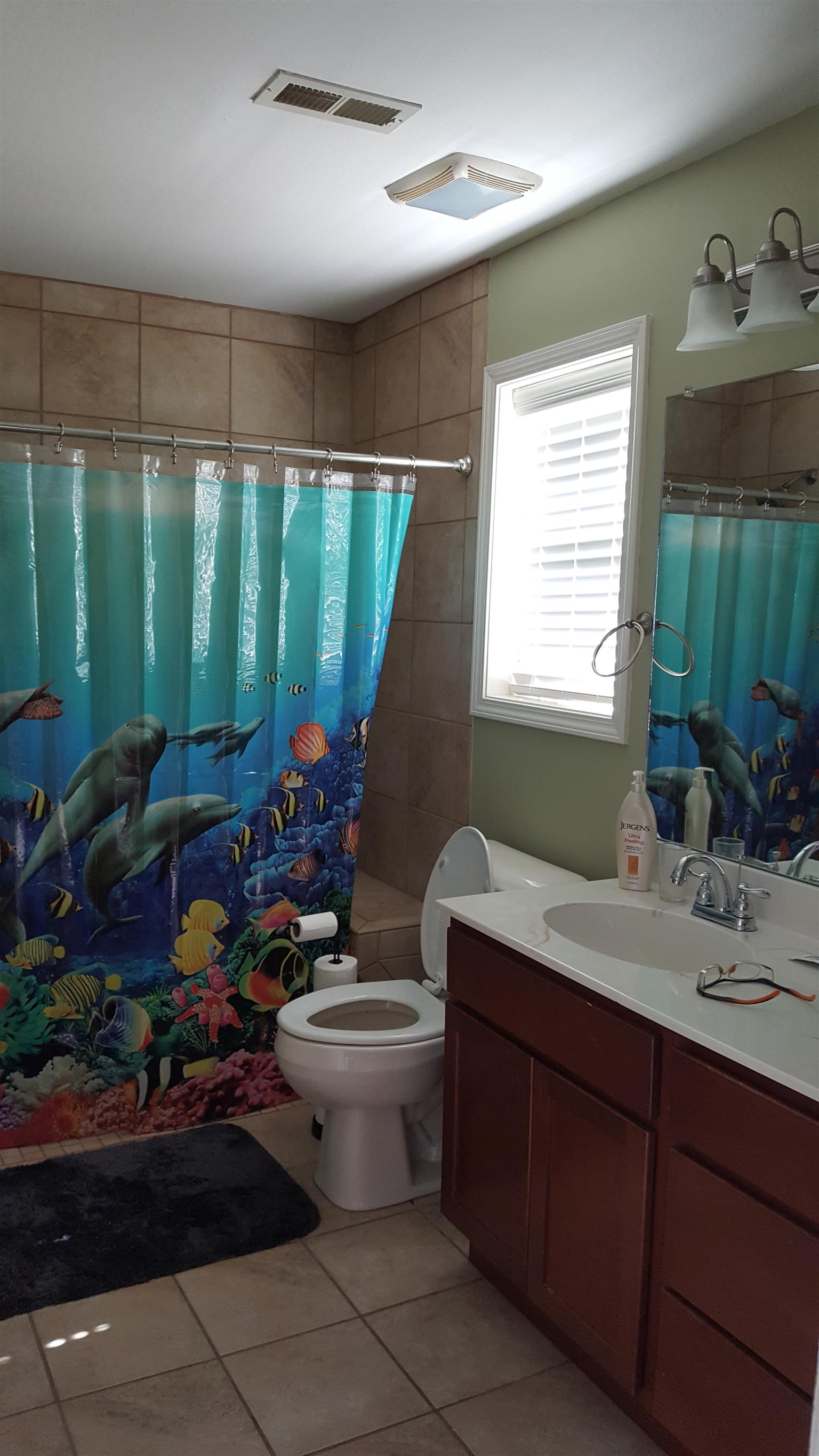2960 Rossview Road Clarksville, TN 37043 - Photo 17 of 26 a room with furniture a window and potted plants