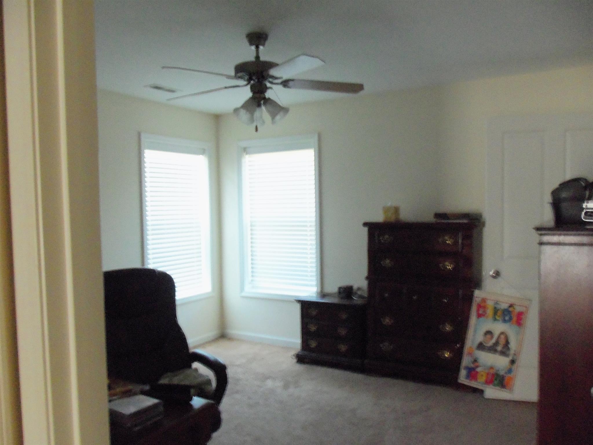 2960 Rossview Road Clarksville, TN 37043 - Photo 19 of 26 a living room with furniture and a window