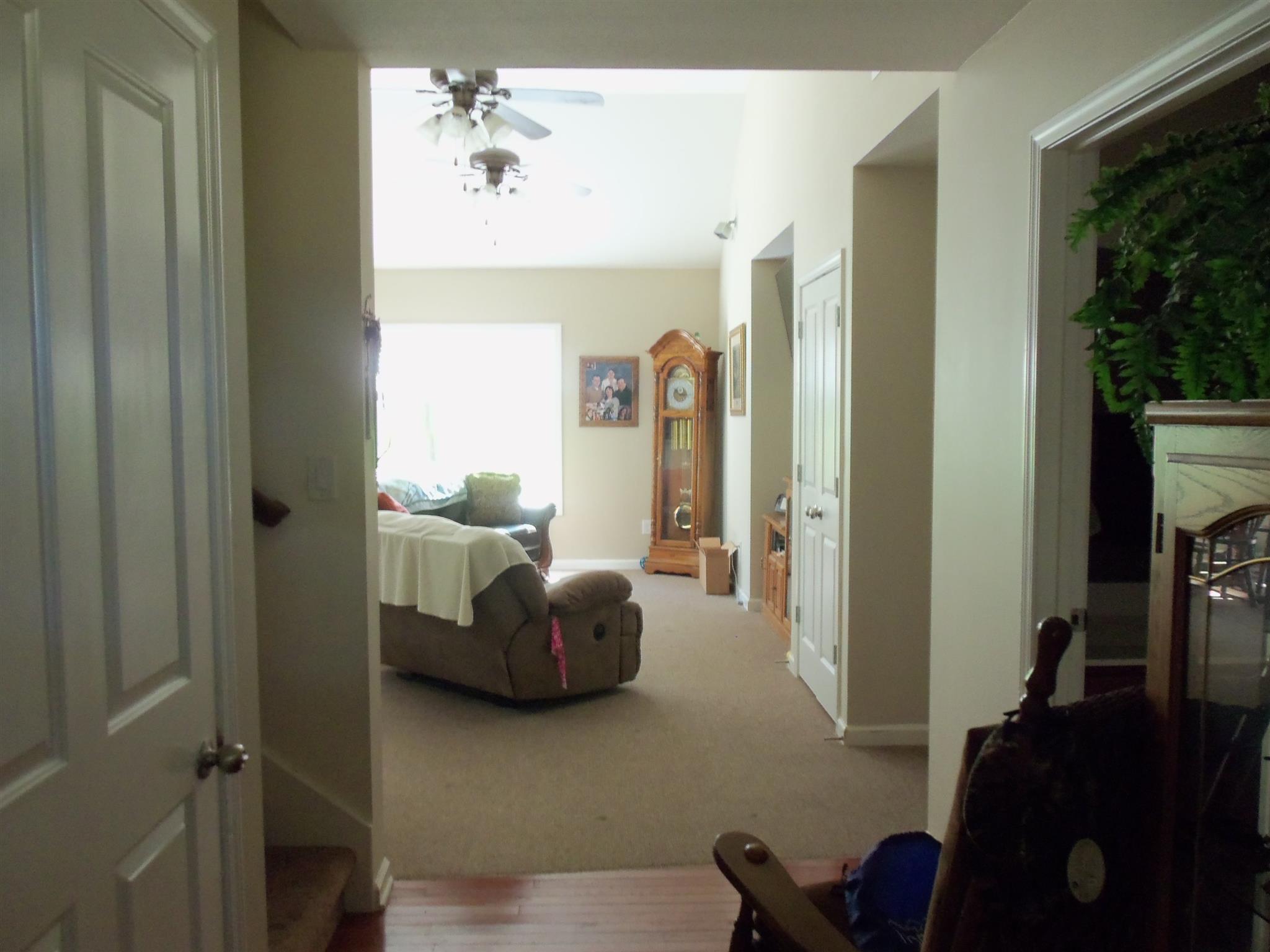 2960 Rossview Road Clarksville, TN 37043 - Photo 3 of 26 a living room with furniture and a flat screen tv