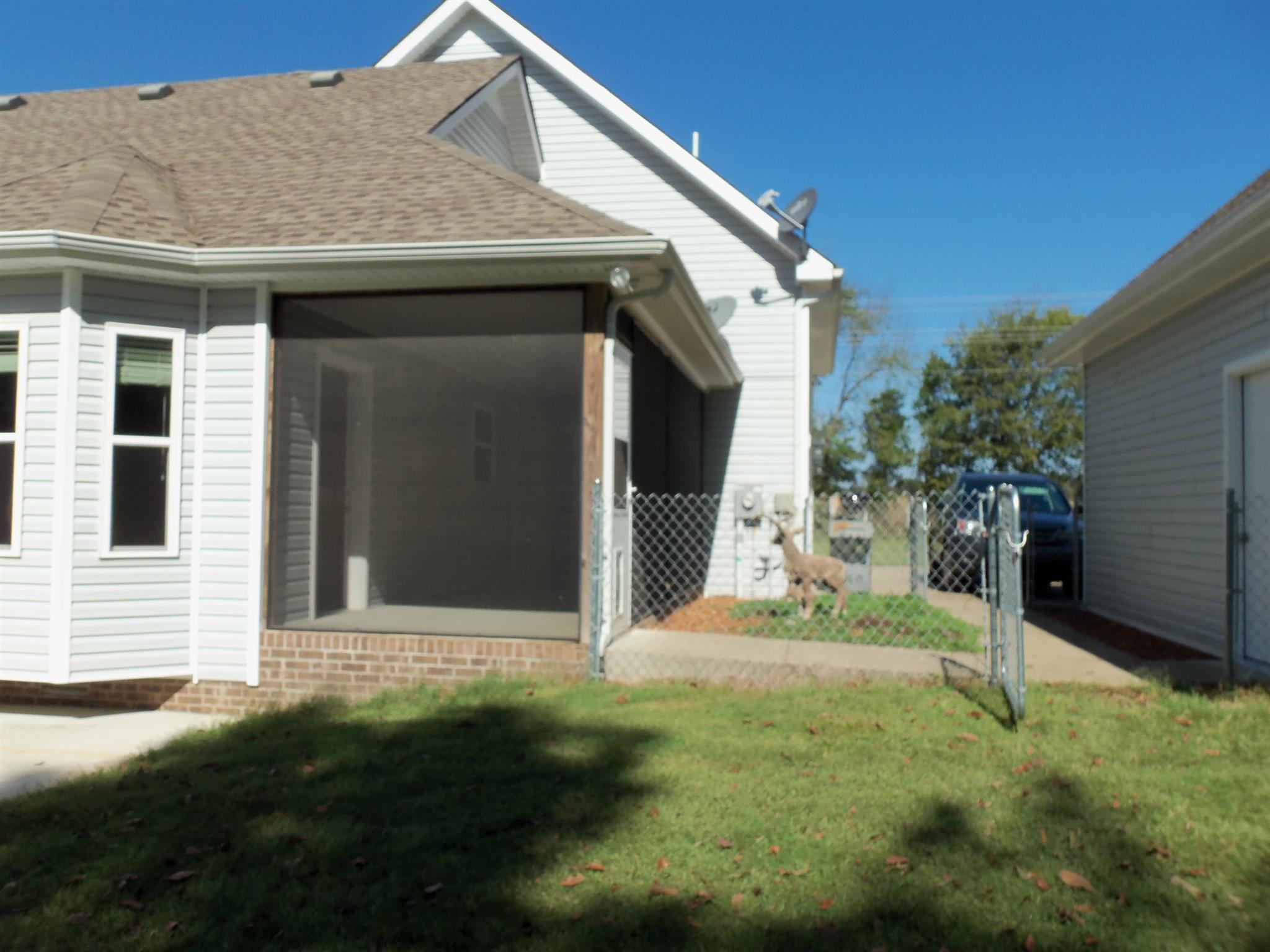 2960 Rossview Road Clarksville, TN 37043 - Photo 21 of 26 a view of a house with backyard