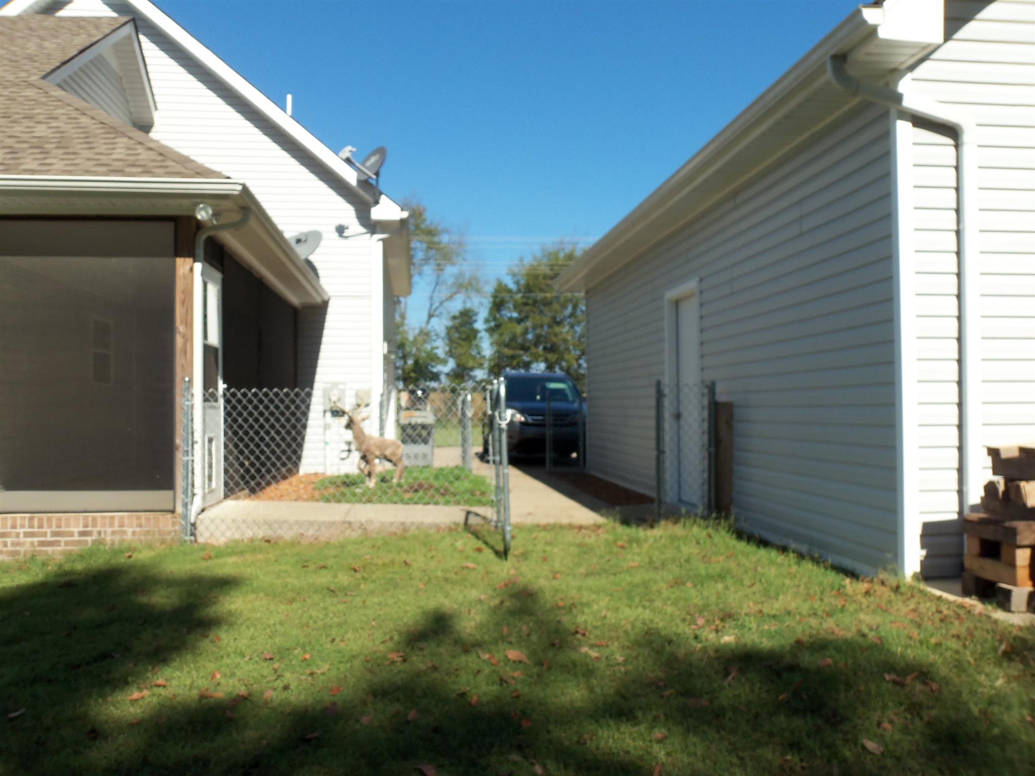 2960 Rossview Road Clarksville, TN 37043 - Photo 22 of 26 a view of backyard of house