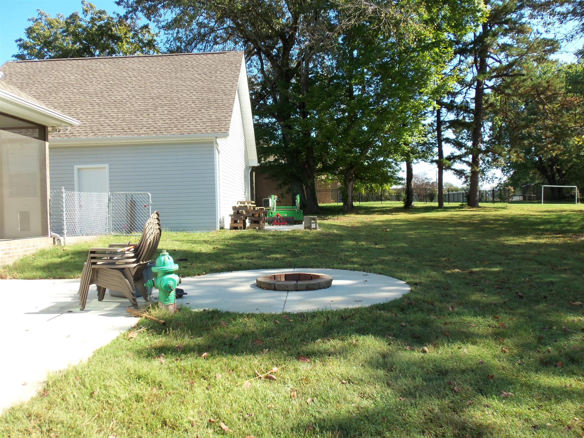 2960 Rossview Road Clarksville, TN 37043 - Photo 26 of 26 a view of a house with backyard and trees