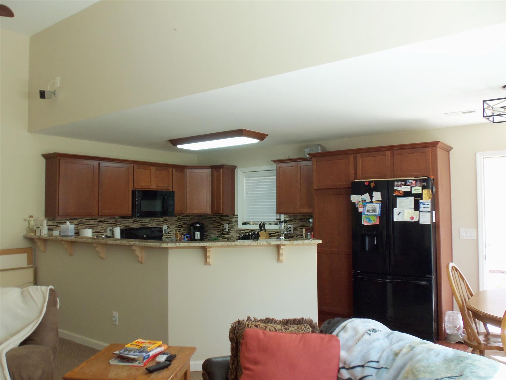 2960 Rossview Road Clarksville, TN 37043 - Photo 7 of 26 a kitchen with stainless steel appliances granite countertop a refrigerator and a stove top oven