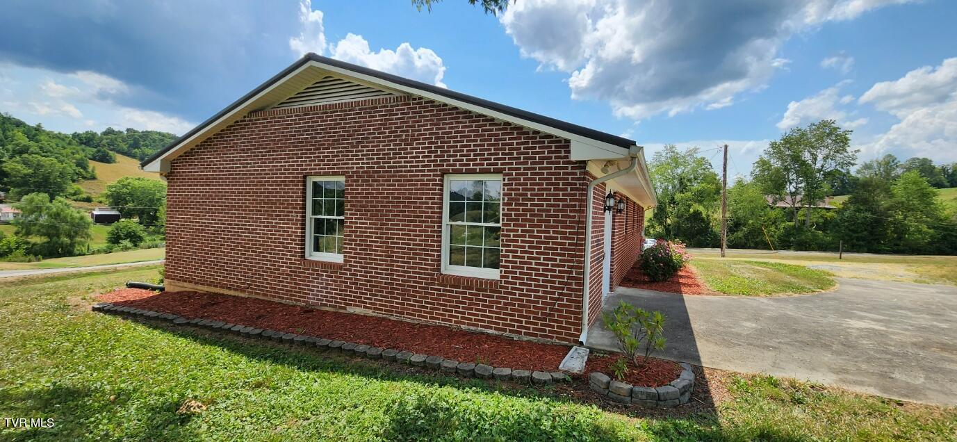 4149 Carters Valley Road Church Hill, TN 37642 - Photo 2 of 46 Side view with back drive