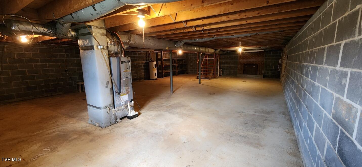 4149 Carters Valley Road Church Hill, TN 37642 - Photo 27 of 46 basement with fp, inside-outside acess