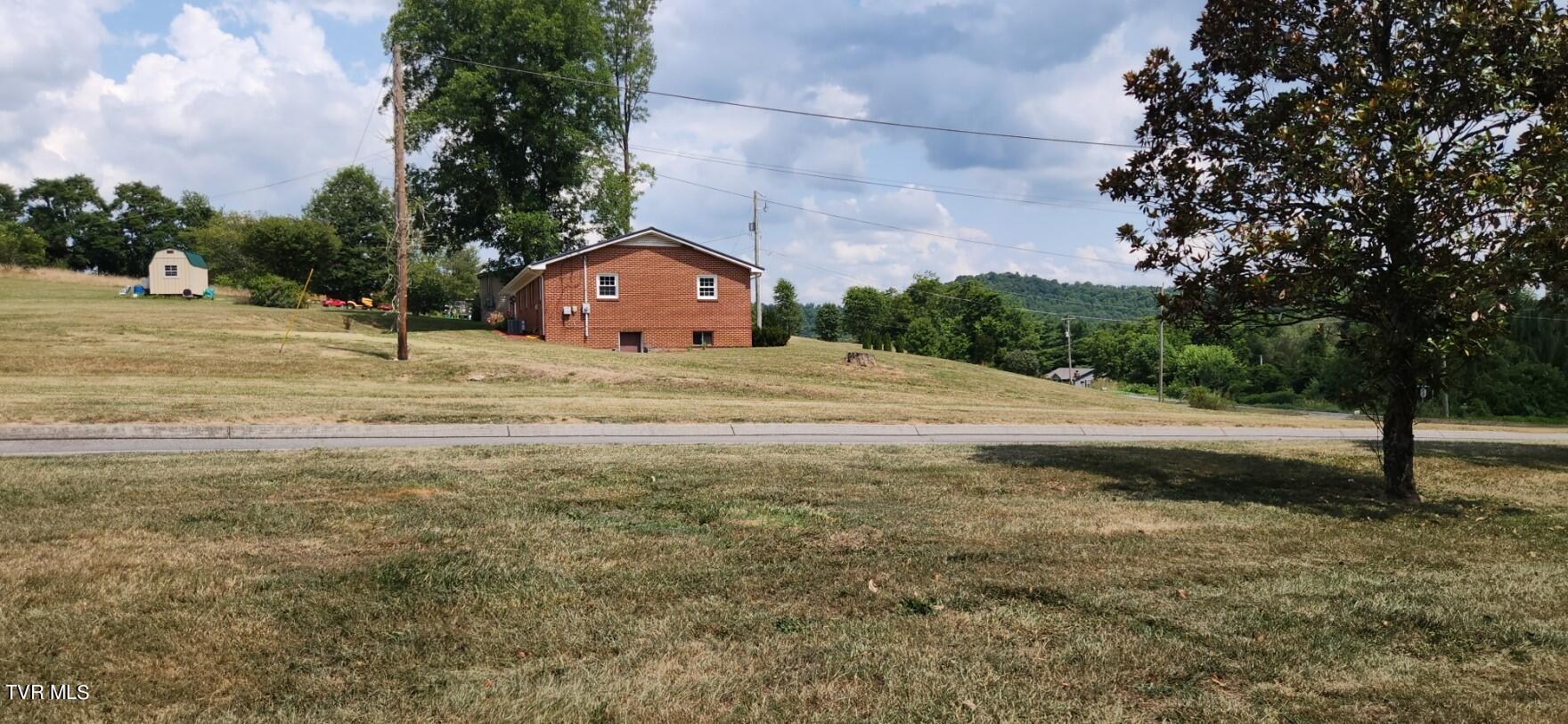 4149 Carters Valley Road Church Hill, TN 37642 - Photo 37 of 46 Side View of front & back yard
