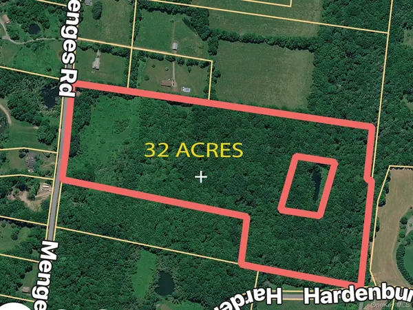 a view of a sign in front of house