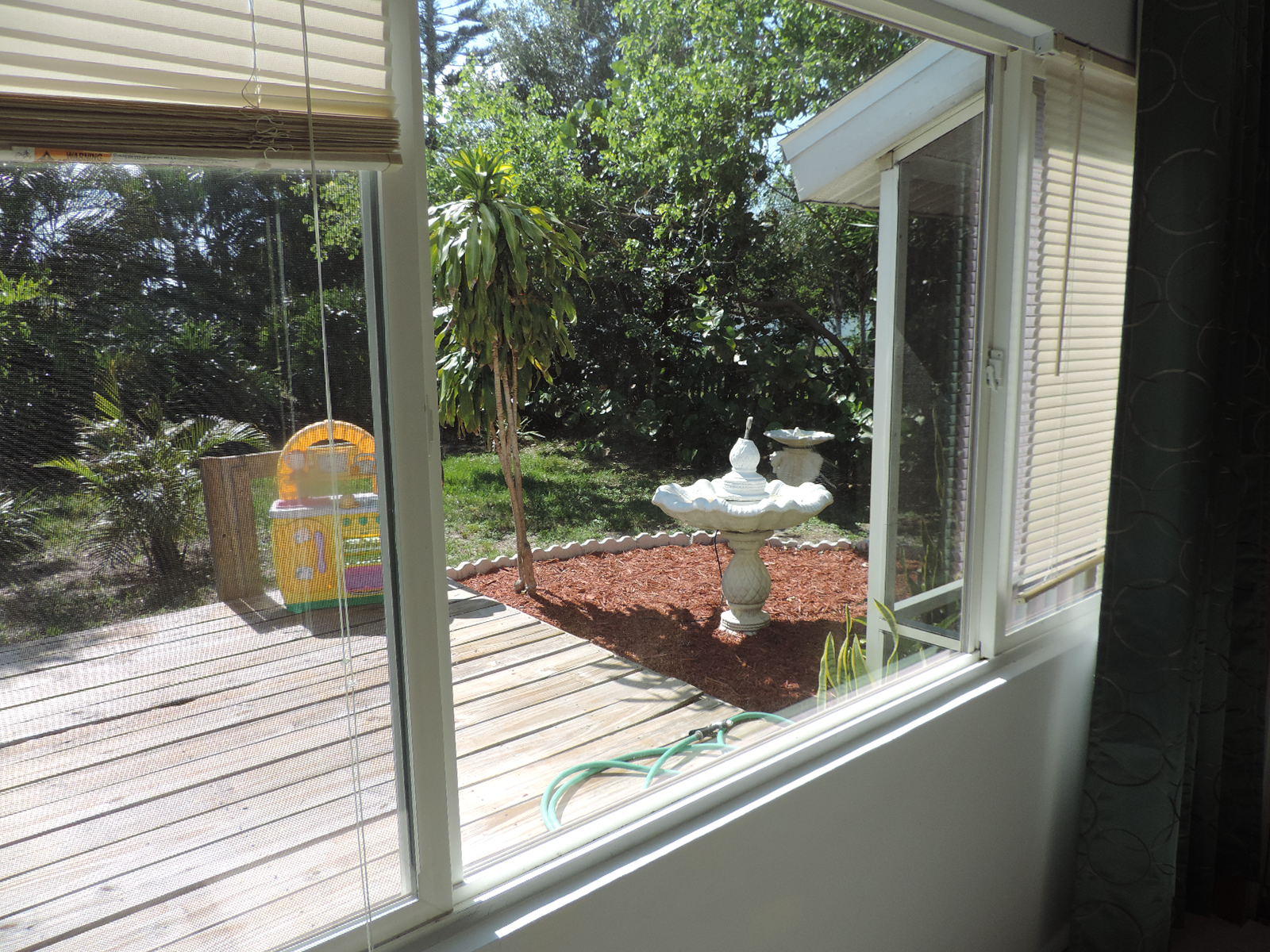 273 Southwest Kentwood Road Port St. Lucie, FL 34953 - Photo 9 of 25 woodeck patio