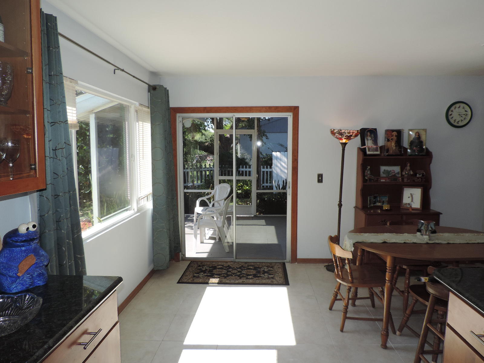 273 Southwest Kentwood Road Port St. Lucie, FL 34953 - Photo 10 of 25 view to screened paito