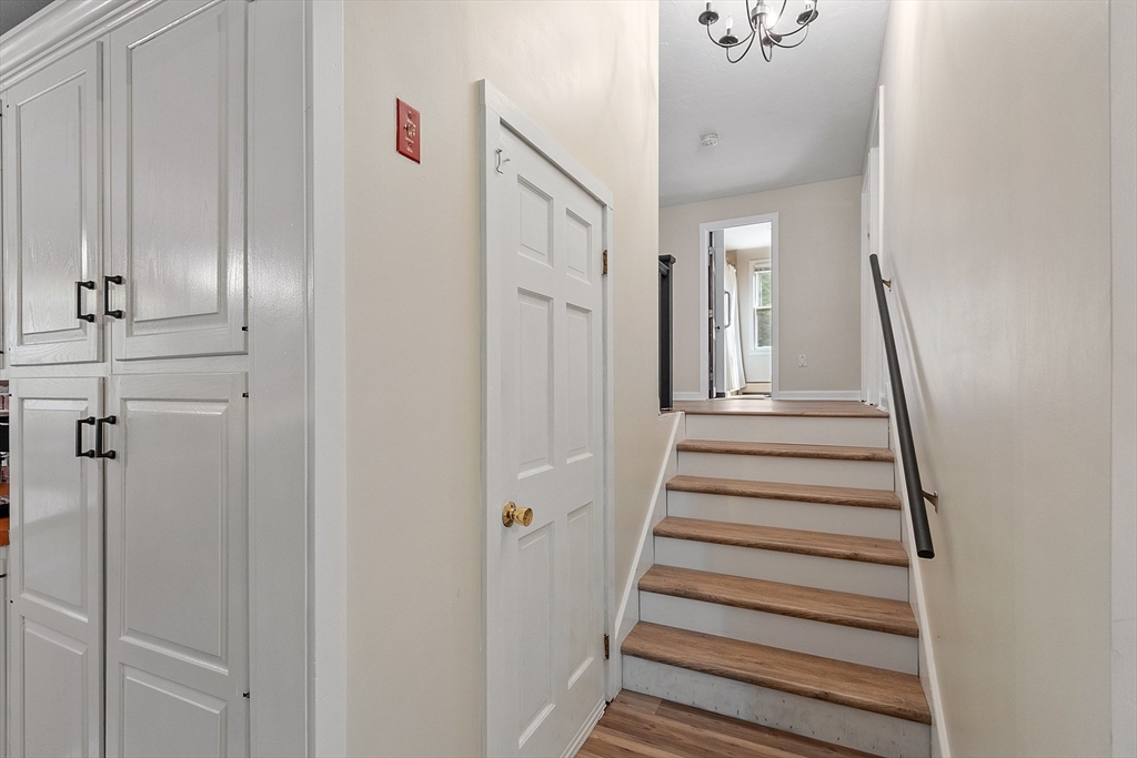215 Colburn Road Temple, NH 03084 - Photo 17 of 40 a view of a hallway with wooden floor and entryway