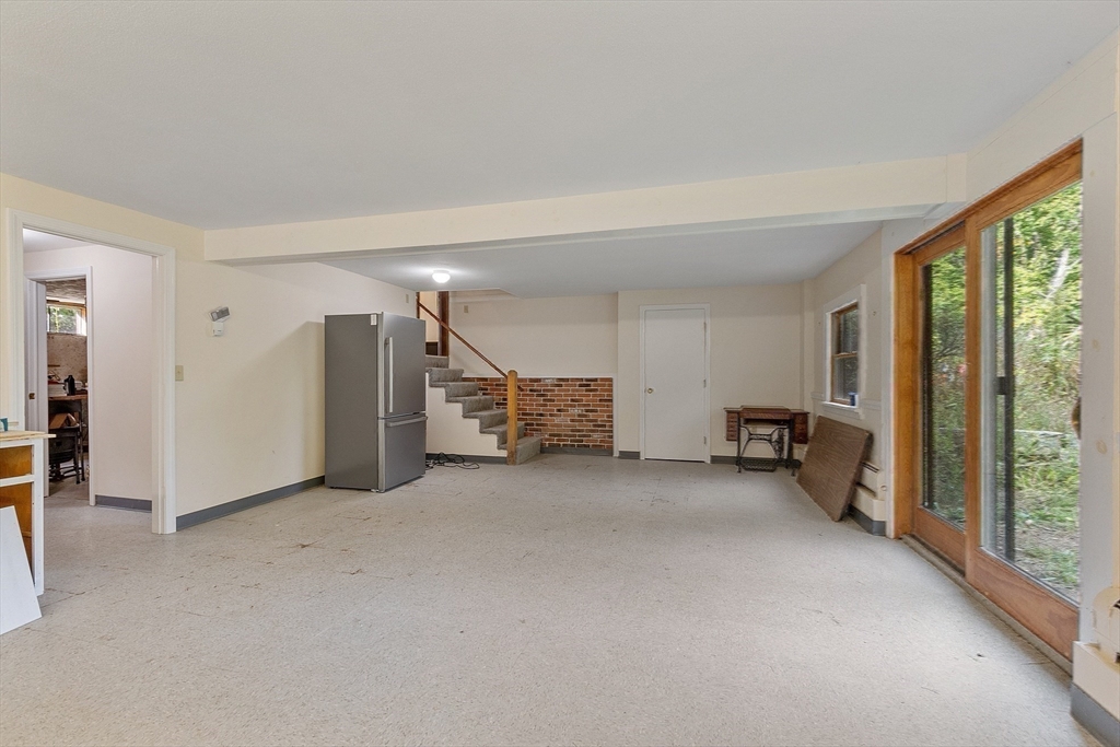 215 Colburn Road Temple, NH 03084 - Photo 26 of 40 a view of a livingroom with furniture and a gate