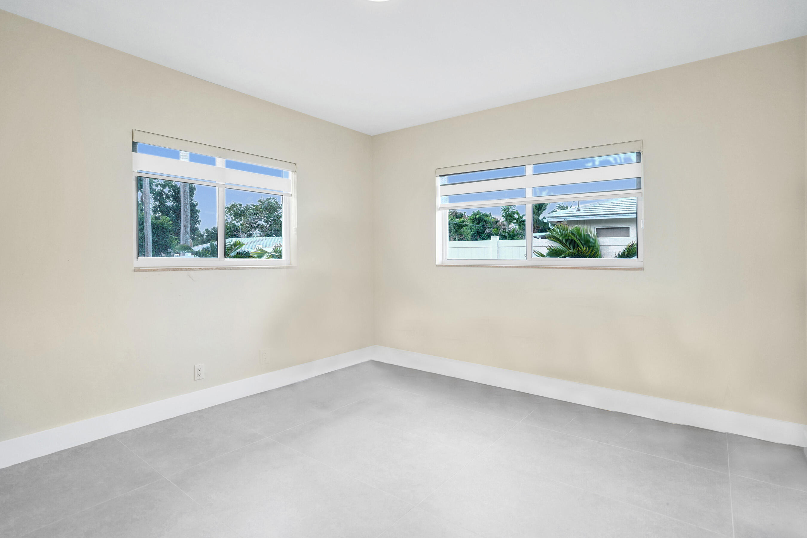 3779 Northwest 4th Court Boca Raton, FL 33431 - Photo 15 of 20 an empty room with a window