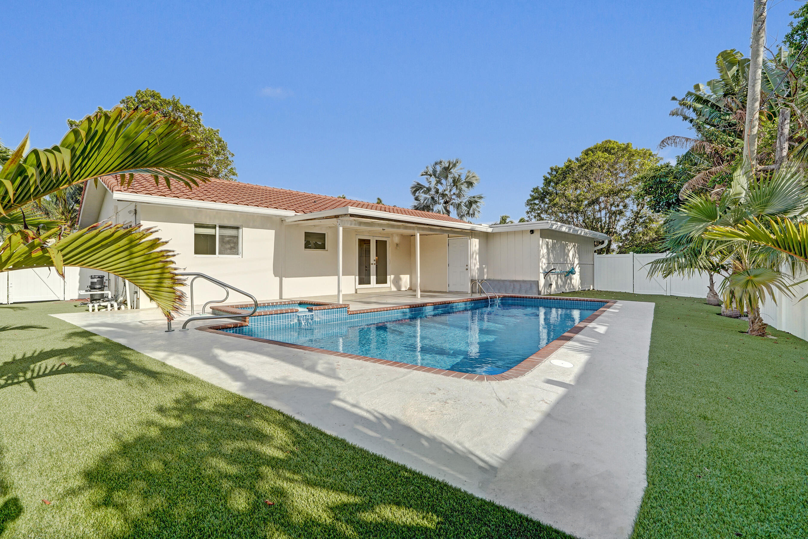 3779 Northwest 4th Court Boca Raton, FL 33431 - Photo 2 of 20 front view of a house with a yard