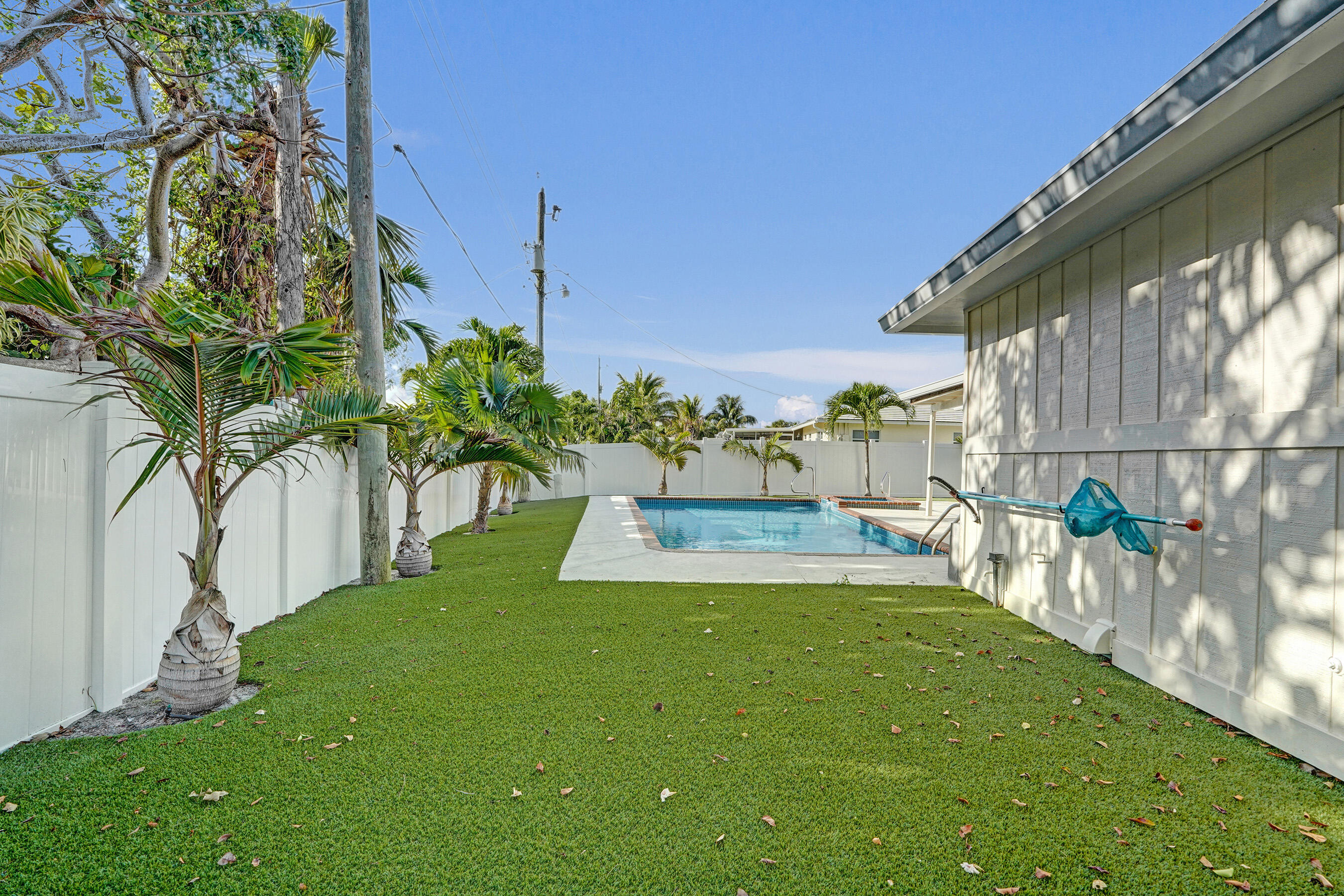 3779 Northwest 4th Court Boca Raton, FL 33431 - Photo 4 of 20 a view of a garden with a slide