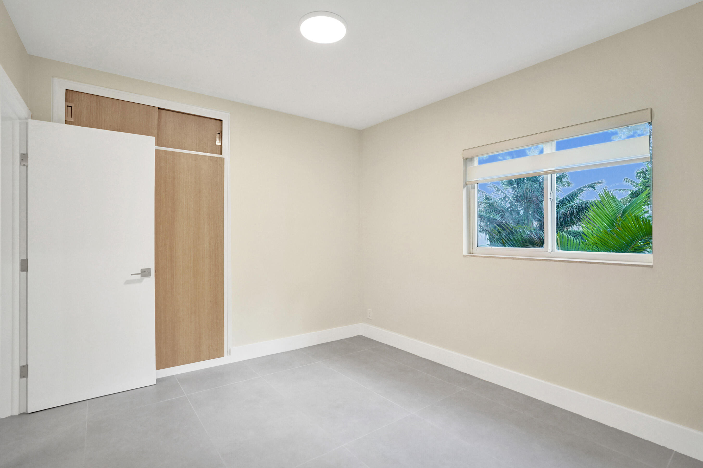 3779 Northwest 4th Court Boca Raton, FL 33431 - Photo 7 of 20 a view of an empty room with a window