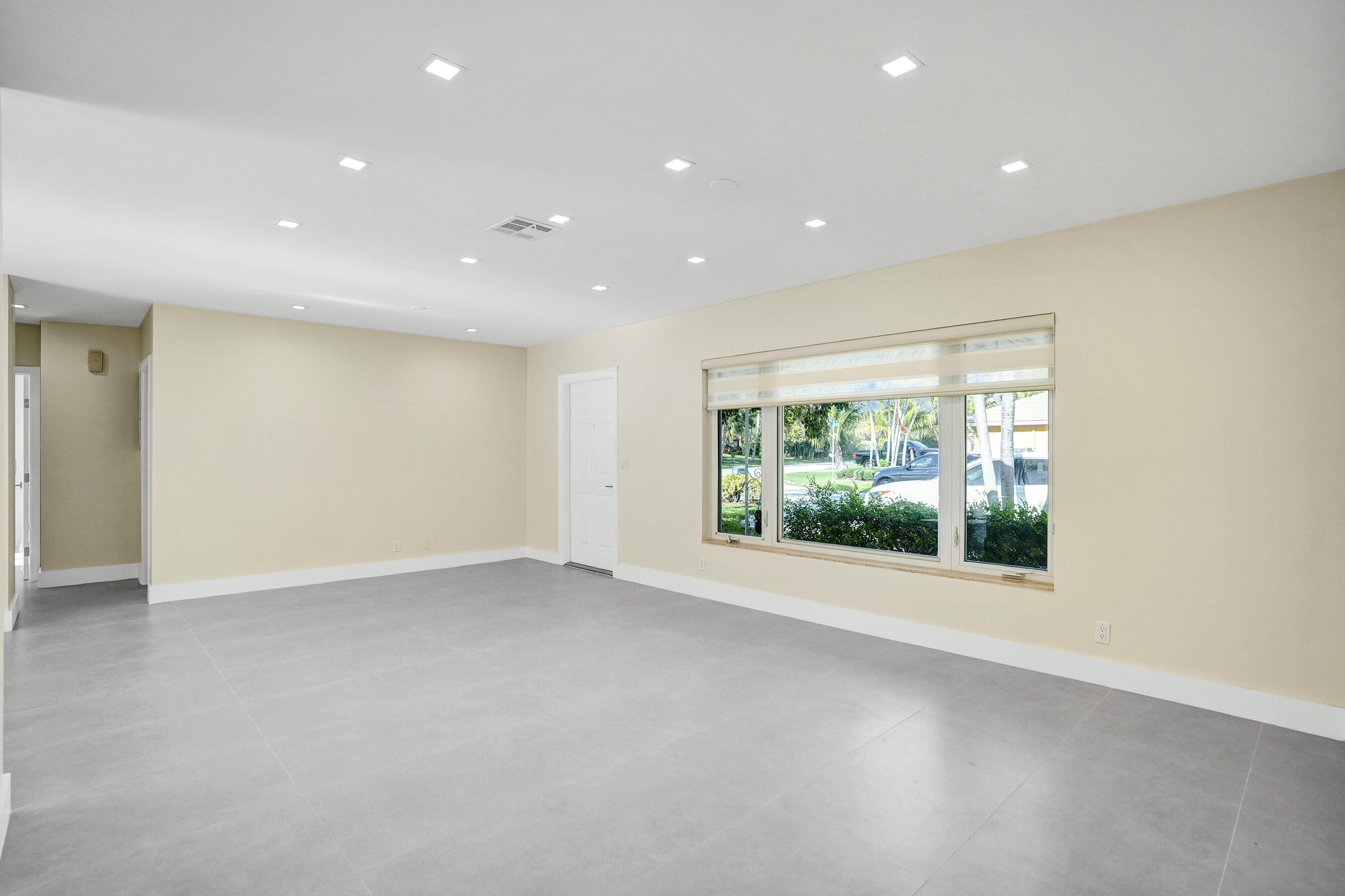 3779 Northwest 4th Court Boca Raton, FL 33431 - Photo 8 of 20 an empty room with windows