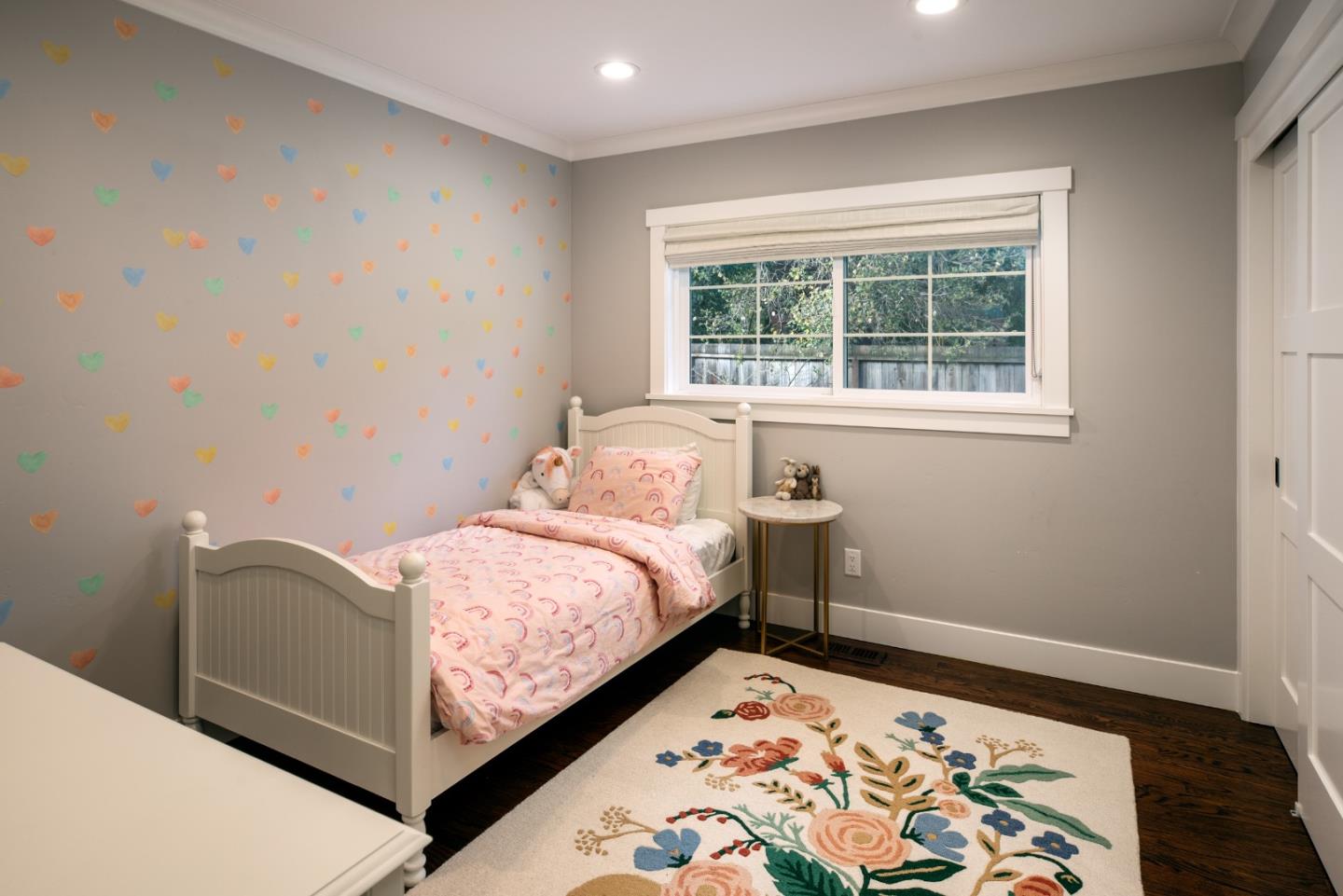 135 Emma Lane Menlo Park, CA 94025 - Photo 11 of 16 a bed sitting in a bedroom next to a window