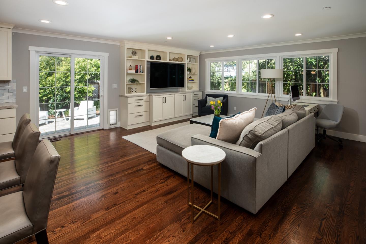 135 Emma Lane Menlo Park, CA 94025 - Photo 5 of 16 a living room with furniture and a flat screen tv
