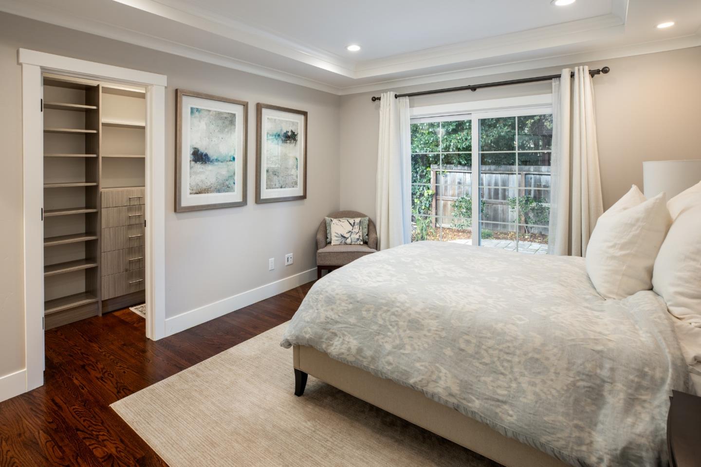 135 Emma Lane Menlo Park, CA 94025 - Photo 9 of 16 a bed sitting in a bedroom next to a window