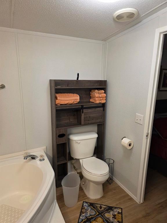 115 Yates Circle Aledo, TX 76008 - Photo 24 of 31 a bathroom with a sink and toilet