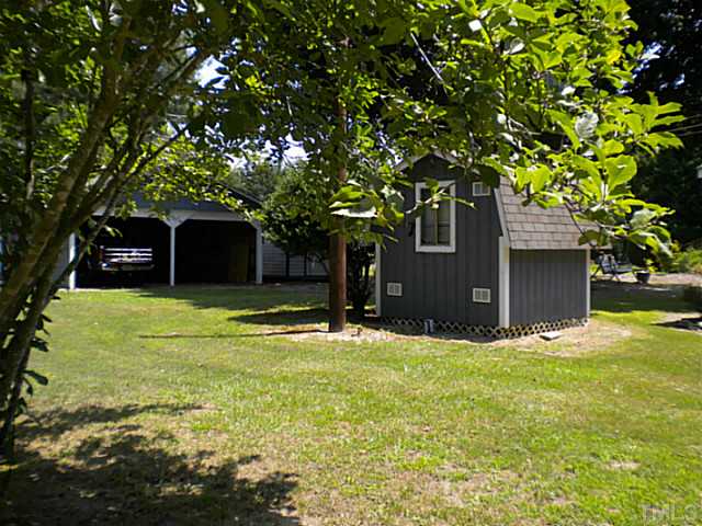 1024 Pagan Road Raleigh, NC 27603 - Photo 19 of 25 a view of a house with a yard