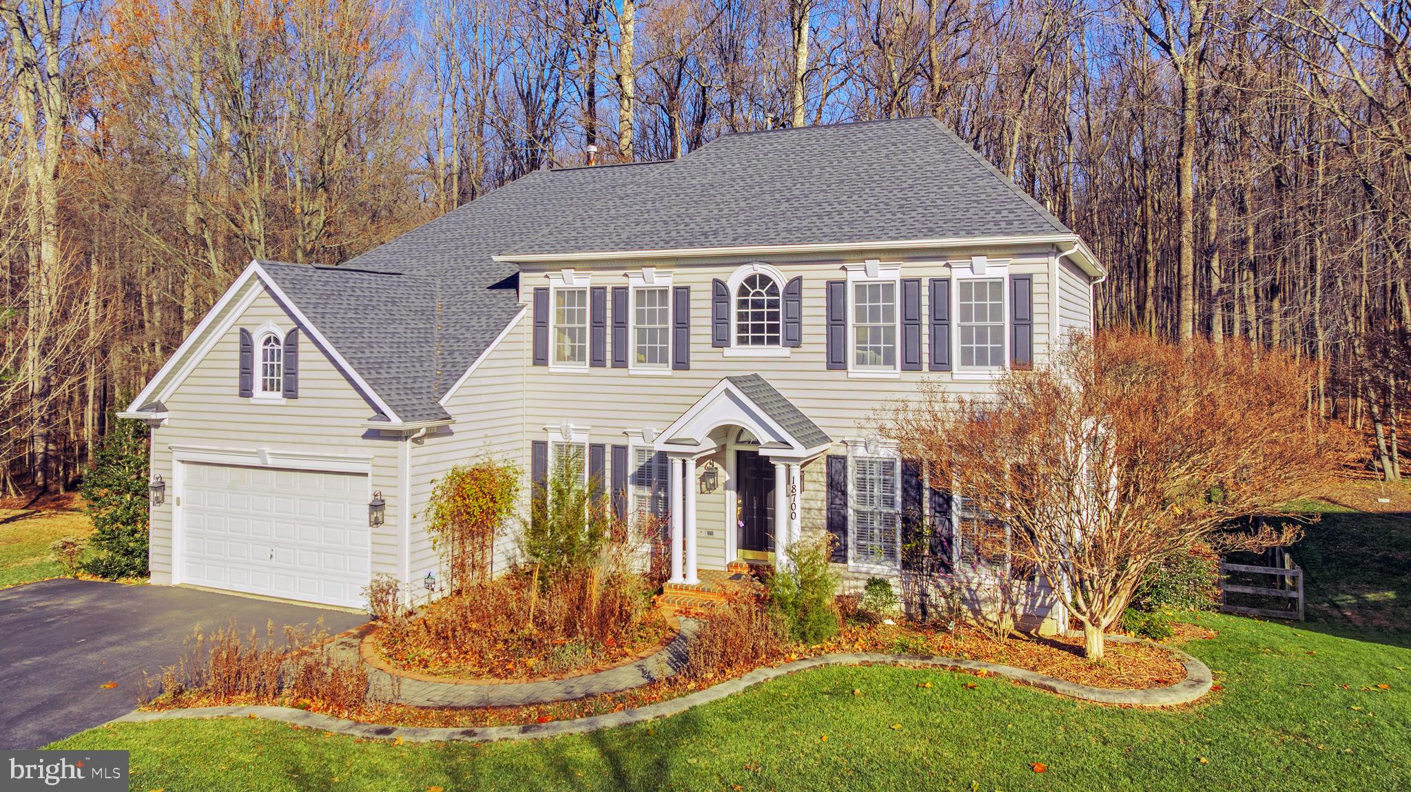 18700 Olney Mill Road Olney, MD 20832 - Photo 1 of 86 a front view of a house with a yard