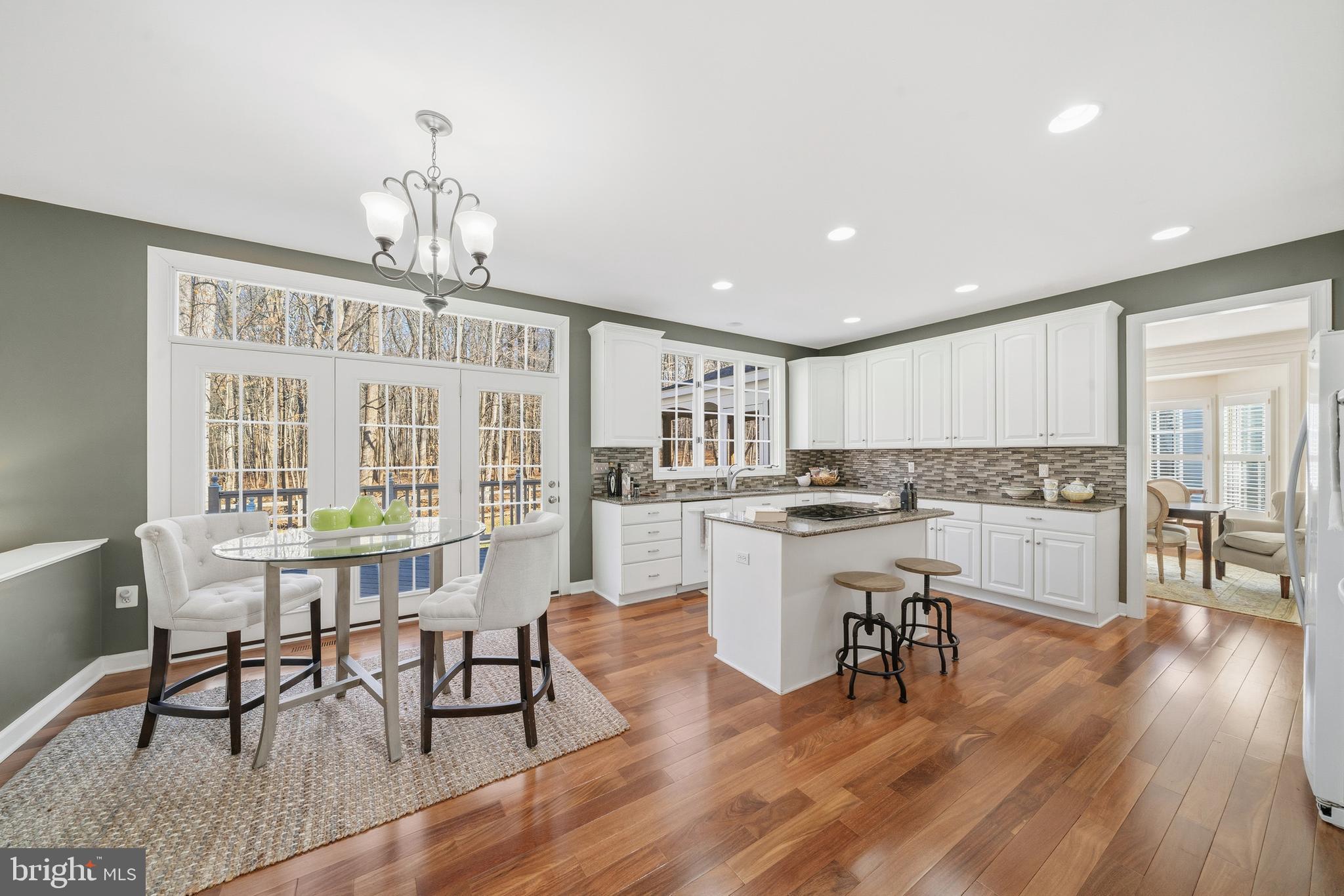 18700 Olney Mill Road Olney, MD 20832 - Photo 20 of 86 a view of a dining room with furniture window and wooden floor