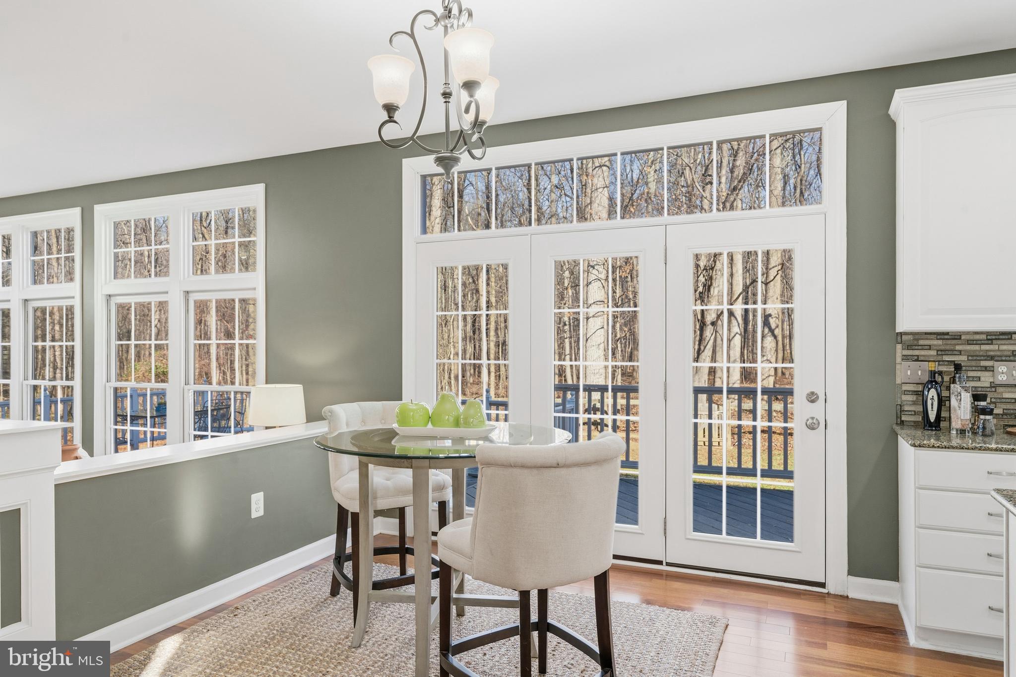 18700 Olney Mill Road Olney, MD 20832 - Photo 22 of 86 a dining room with furniture window wooden floor