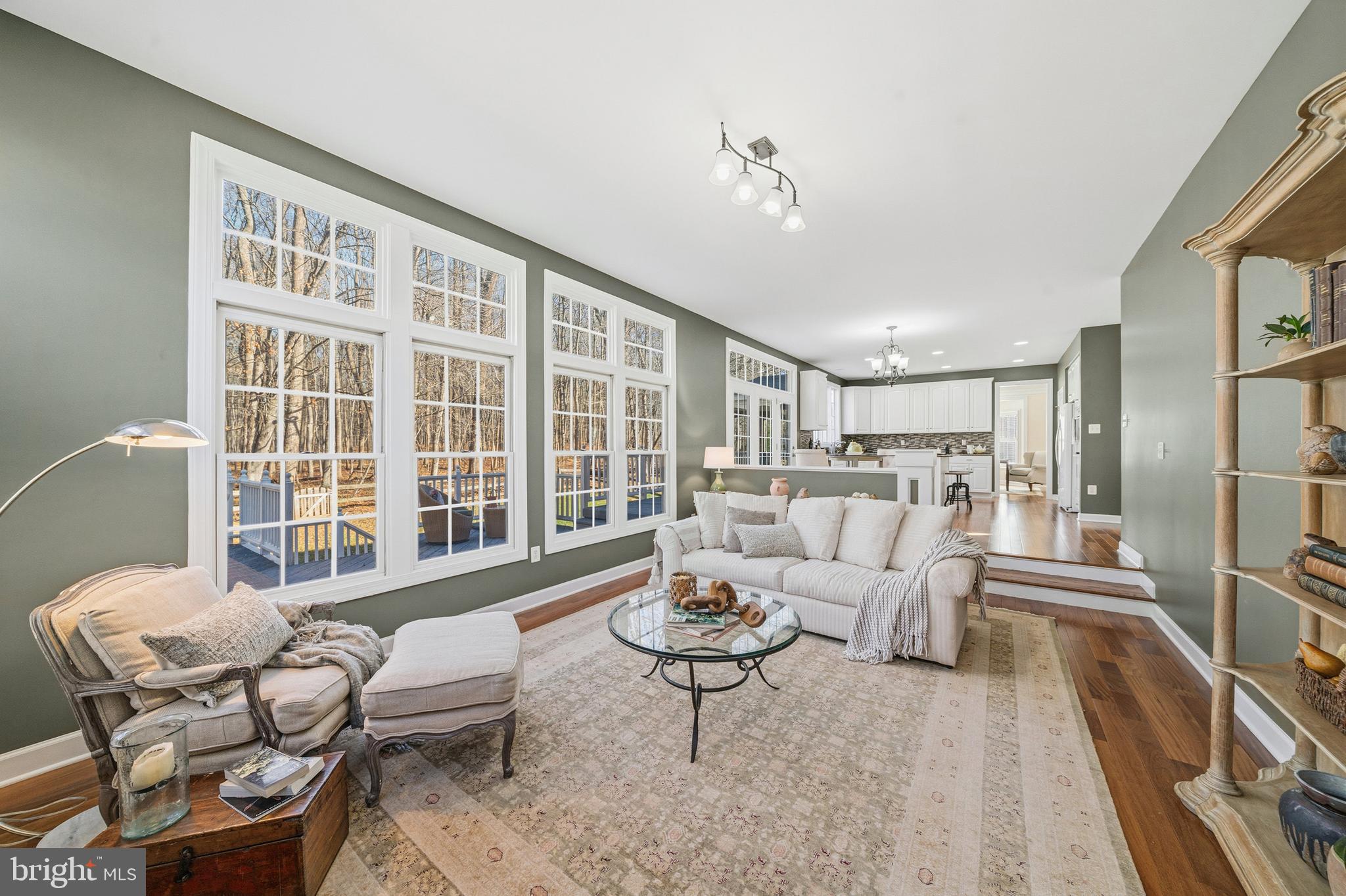 18700 Olney Mill Road Olney, MD 20832 - Photo 23 of 86 a living room with furniture and a large window