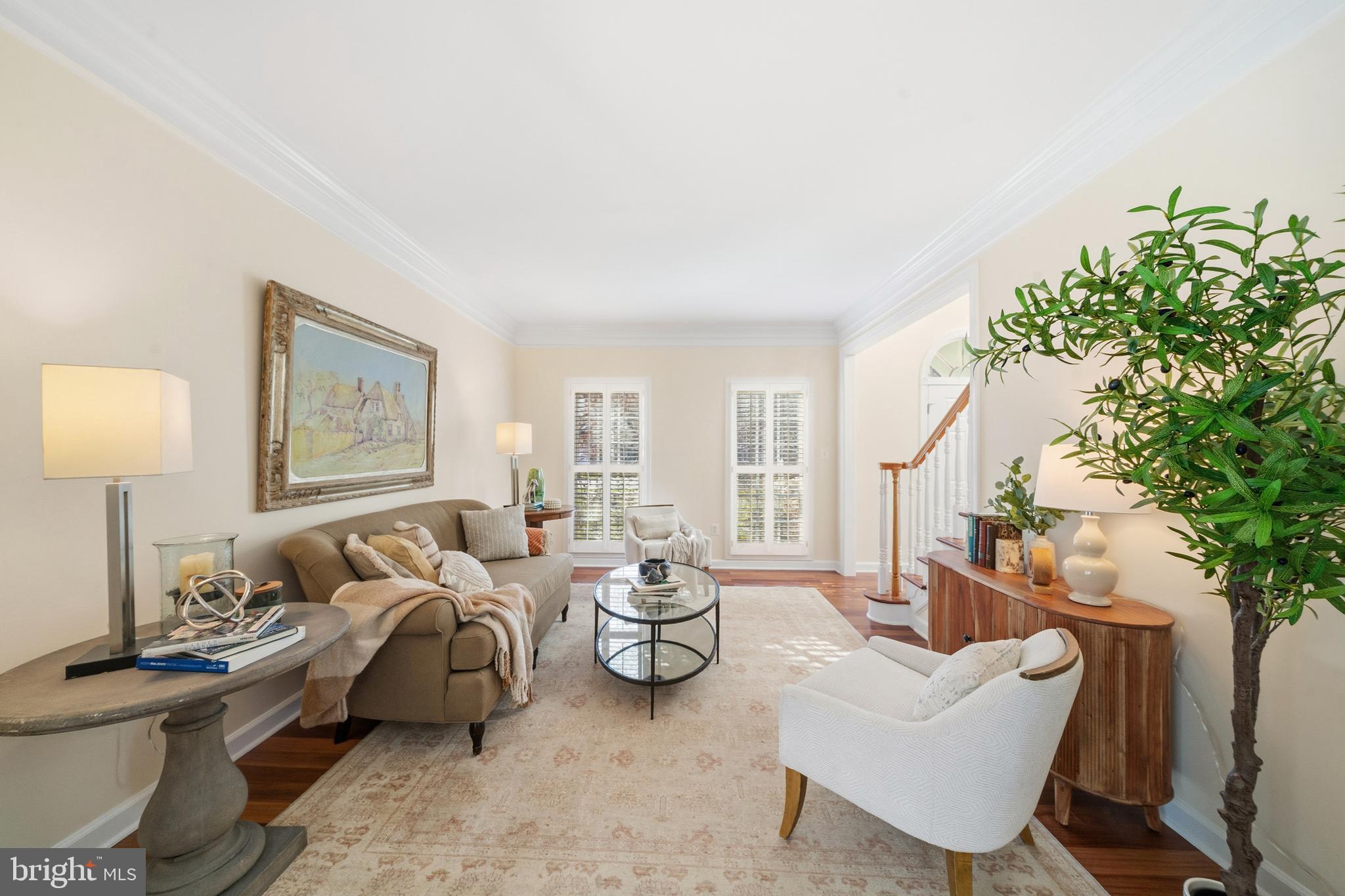 18700 Olney Mill Road Olney, MD 20832 - Photo 31 of 86 a bedroom with furniture and a potted plant