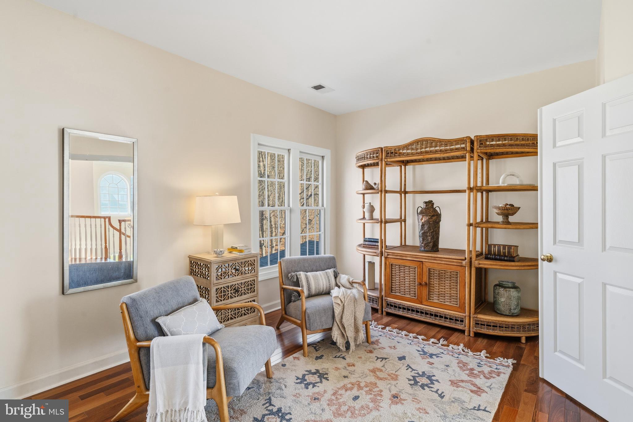 18700 Olney Mill Road Olney, MD 20832 - Photo 45 of 86 a living room with furniture a rug and a window
